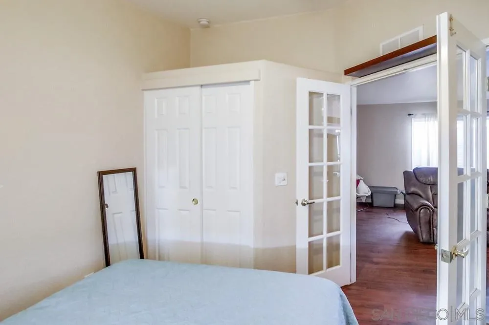 8301 Mission Gorge Road, Unit 248 Santee, CA 92071 - Photo 15 of 24 a view of livingroom with hardwood floor and a ceiling fan