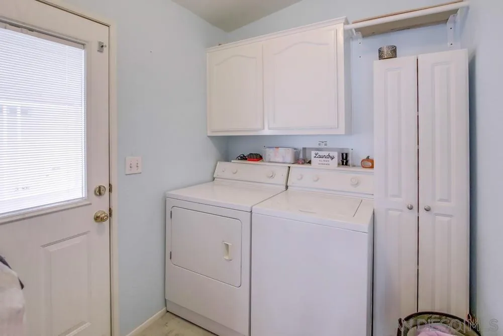 8301 Mission Gorge Road, Unit 248 Santee, CA 92071 - Photo 21 of 24 a utility room with dryer and washer