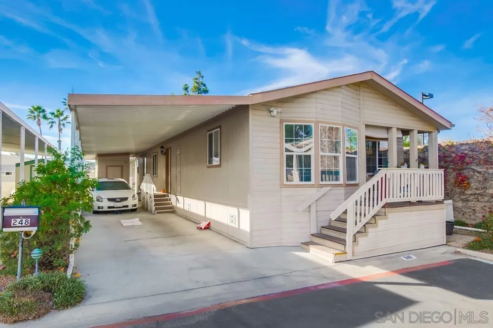 8301 Mission Gorge Road, Unit 248 Santee, CA 92071 - Photo 22 of 24 a view of a house with a patio