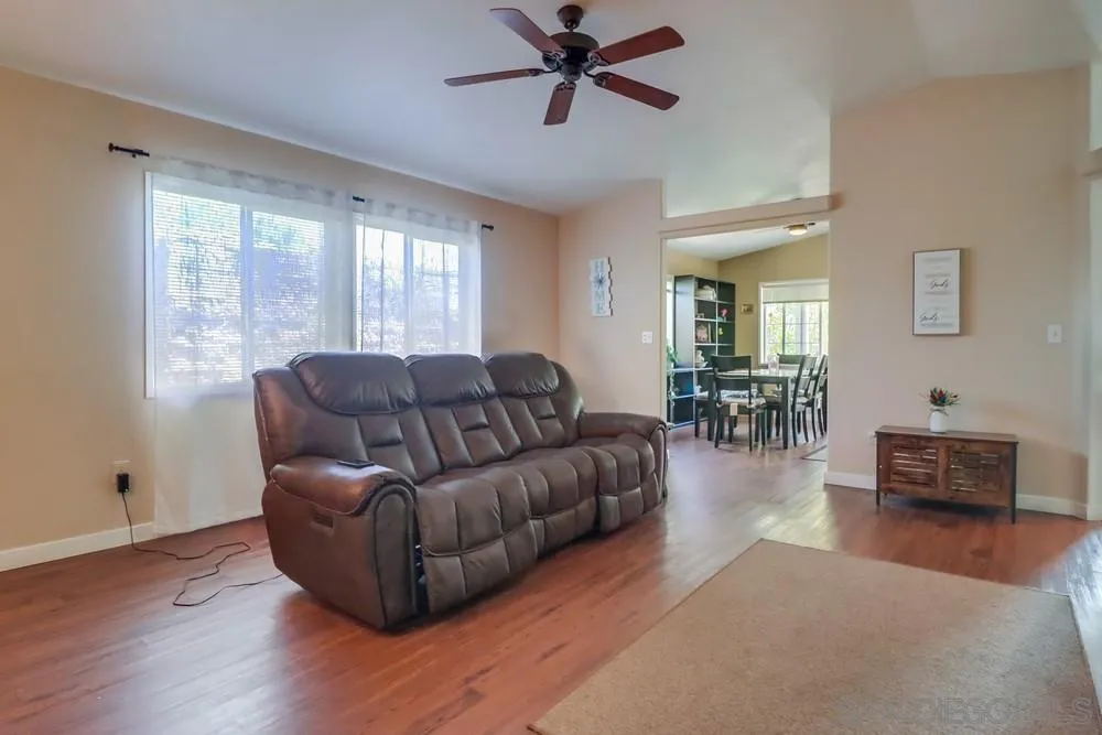 8301 Mission Gorge Road, Unit 248 Santee, CA 92071 - Photo 5 of 24 a living room with furniture and a large window