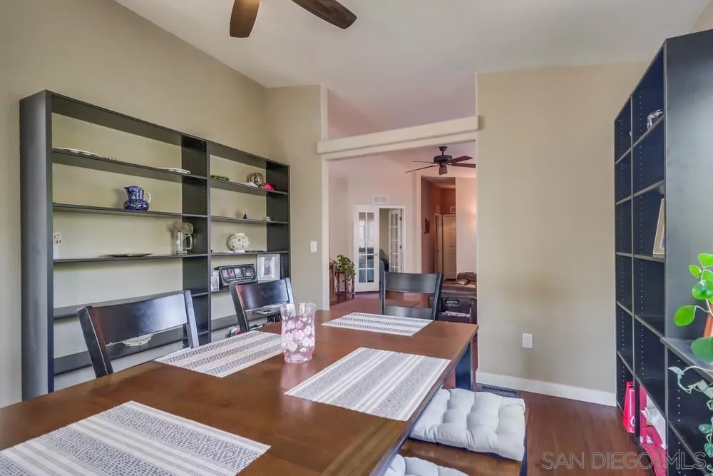 8301 Mission Gorge Road, Unit 248 Santee, CA 92071 - Photo 10 of 24 a living room with furniture and a book shelf