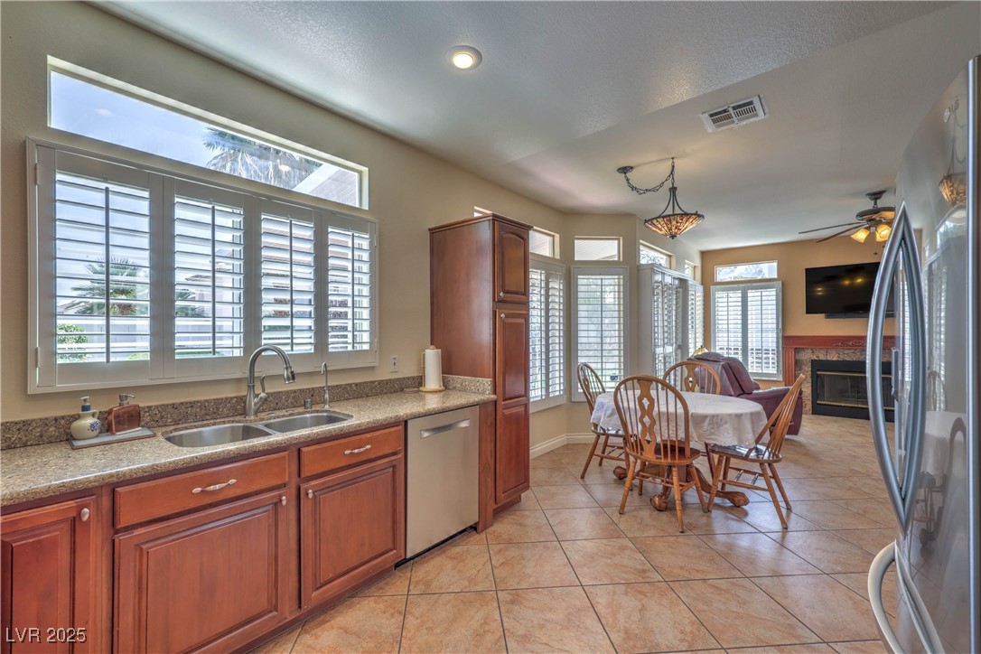 8325 Alta Drive Las Vegas, NV 89145 - Photo 12 of 31 Kitchen featuring Garden Window