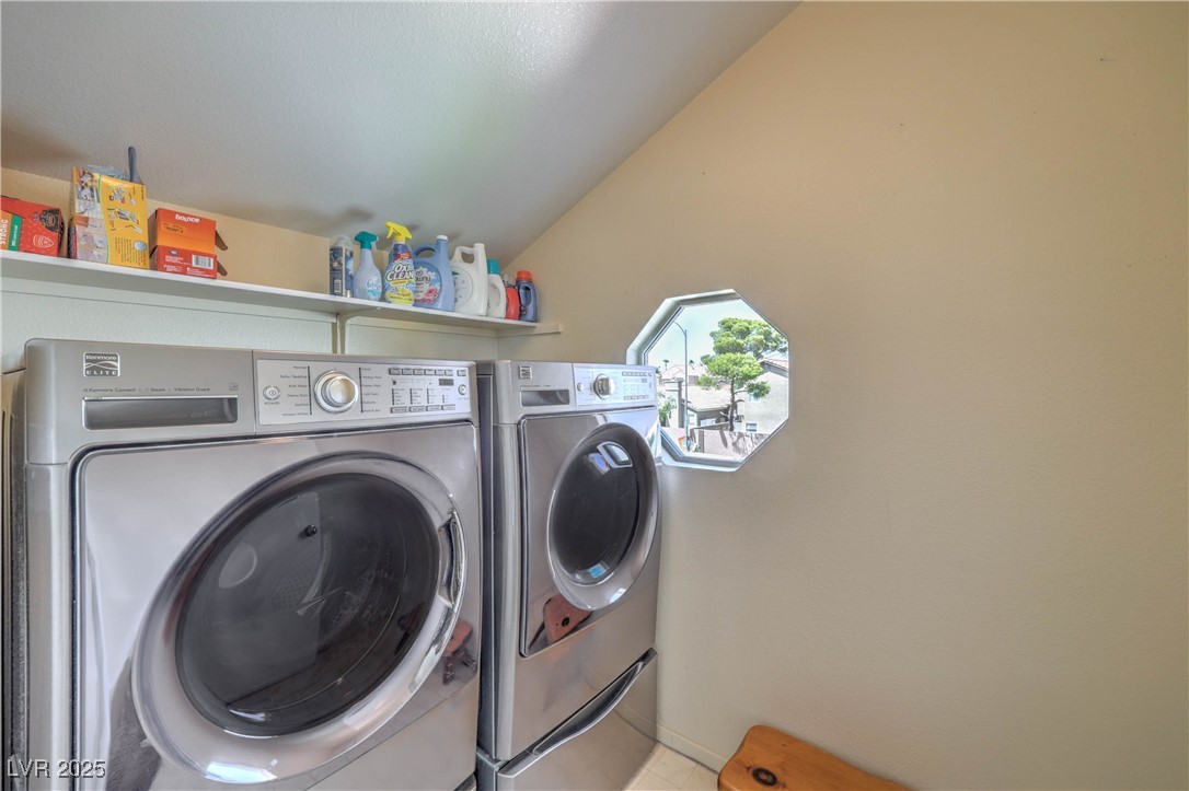 8325 Alta Drive Las Vegas, NV 89145 - Photo 24 of 31 Washroom with washing machine and dryer