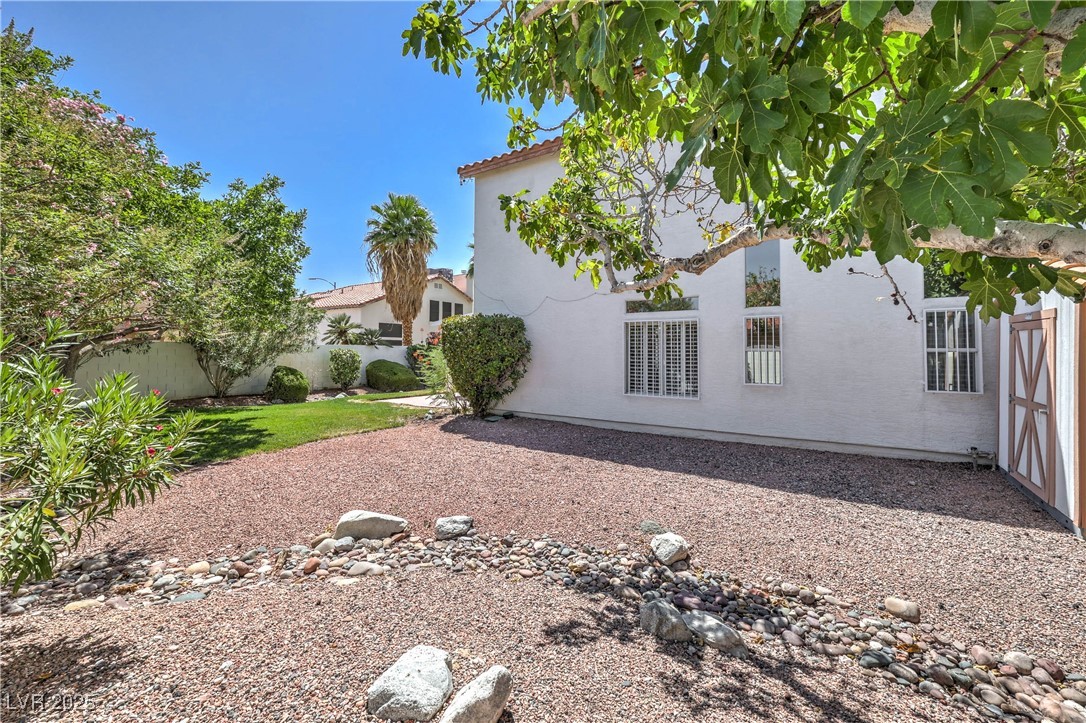 8325 Alta Drive Las Vegas, NV 89145 - Photo 28 of 31 Side yard with storage shed