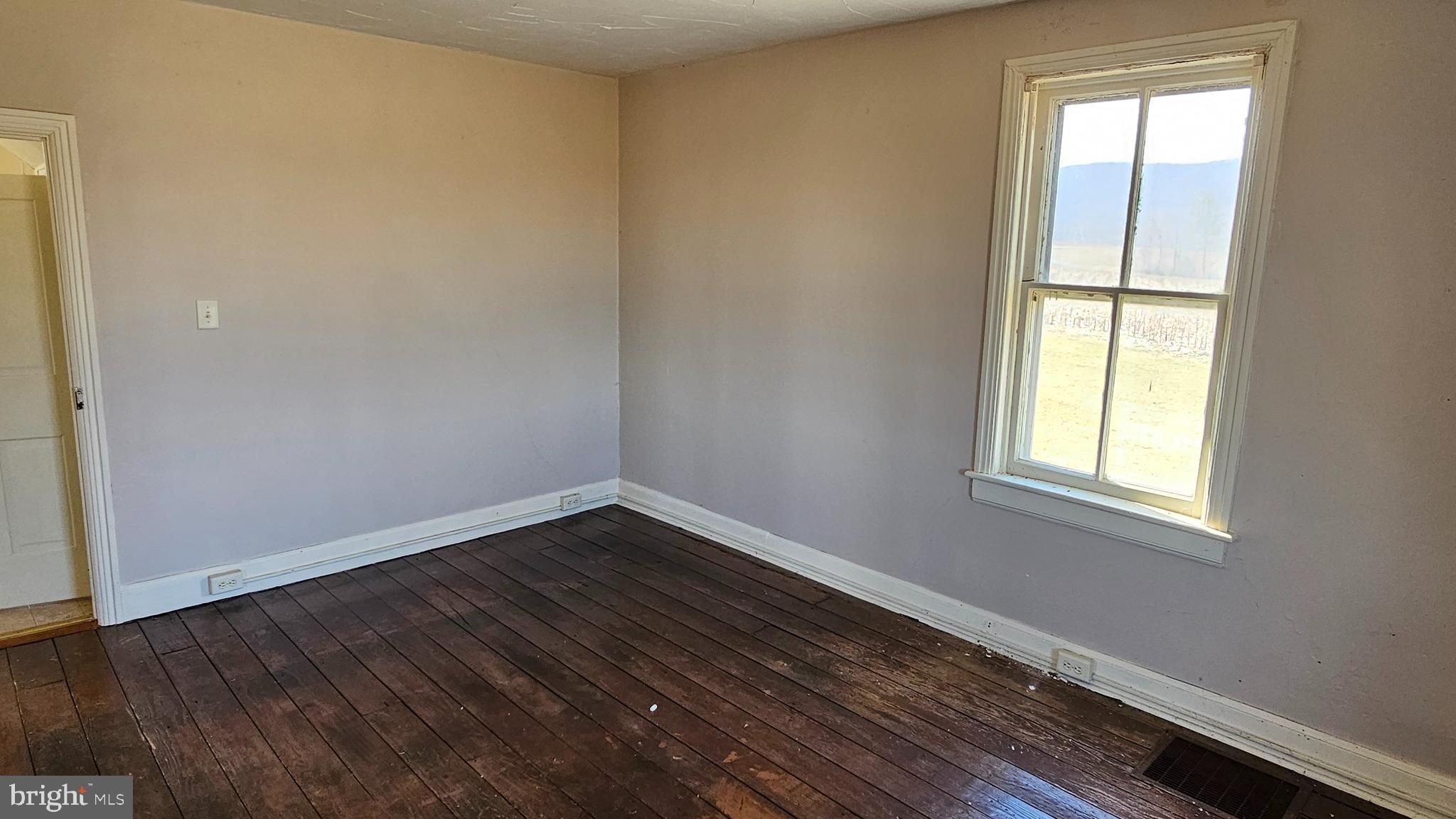 1 26.33 /- Acres Mountain Brook Road St. Thomas, PA 17252 - Photo 30 of 49 a view of an empty room with wooden floor and a window