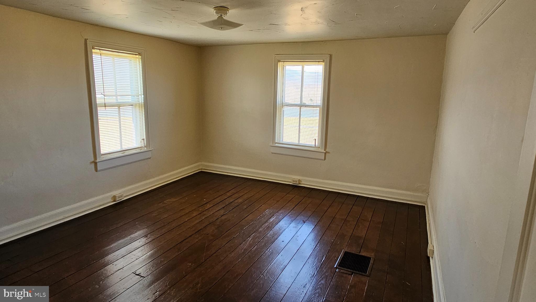 1 26.33 /- Acres Mountain Brook Road St. Thomas, PA 17252 - Photo 32 of 49 an empty room with wooden floor and windows