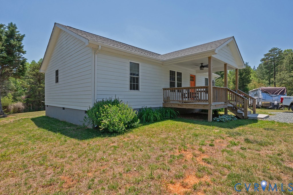 4336 Hells Bend Road Palmyra, VA 22963 - Photo 3 of 35 White hardiplank like siding exterior with a cover
