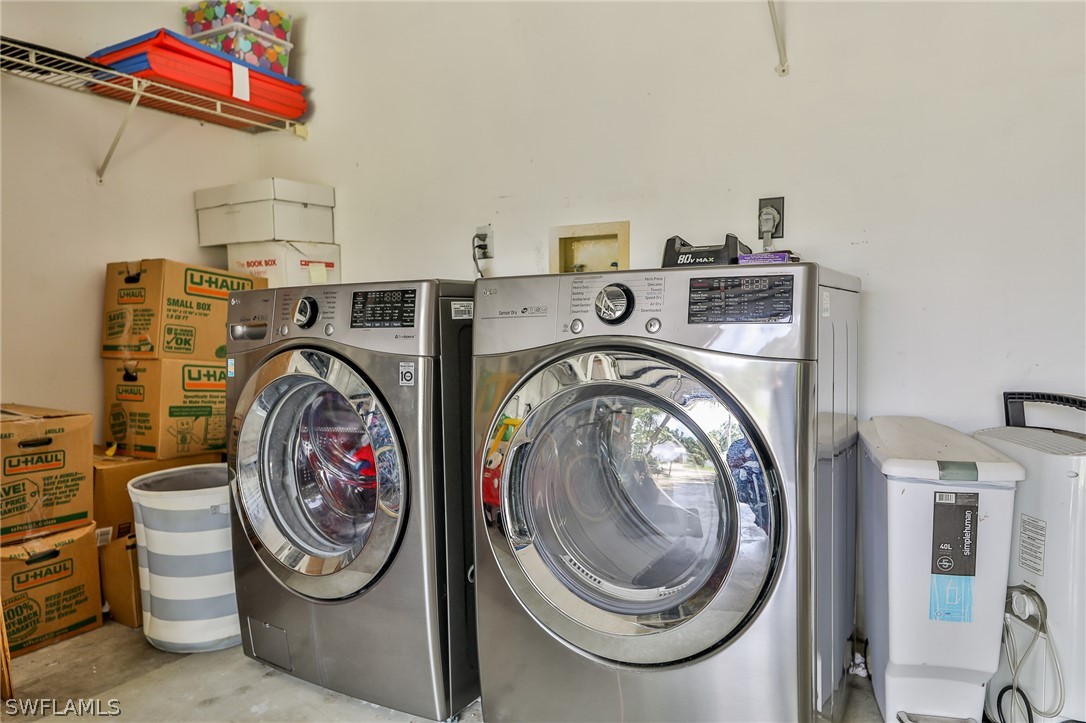 7213 Myrtle Road Fort Myers, FL 33967 - Photo 24 of 35 a utility room with dryer and washer
