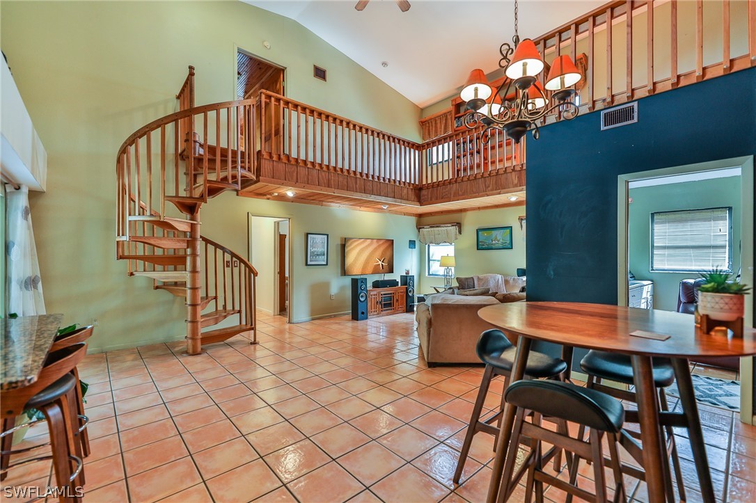 7213 Myrtle Road Fort Myers, FL 33967 - Photo 7 of 35 a view of a house with a table and chairs