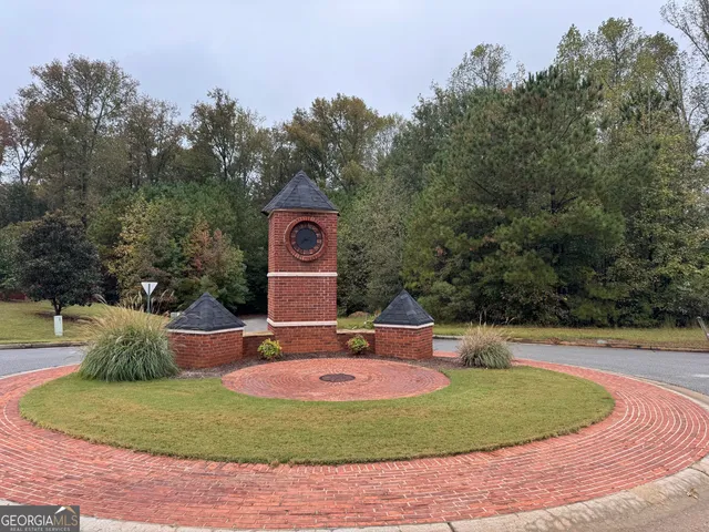 a view of backyard with green space