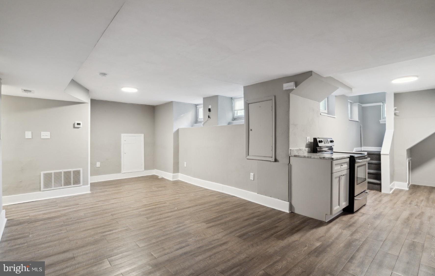 38 Copley Road Upper Darby, PA 19082 - Photo 19 of 22 a view of a kitchen with a sink and a refrigerator