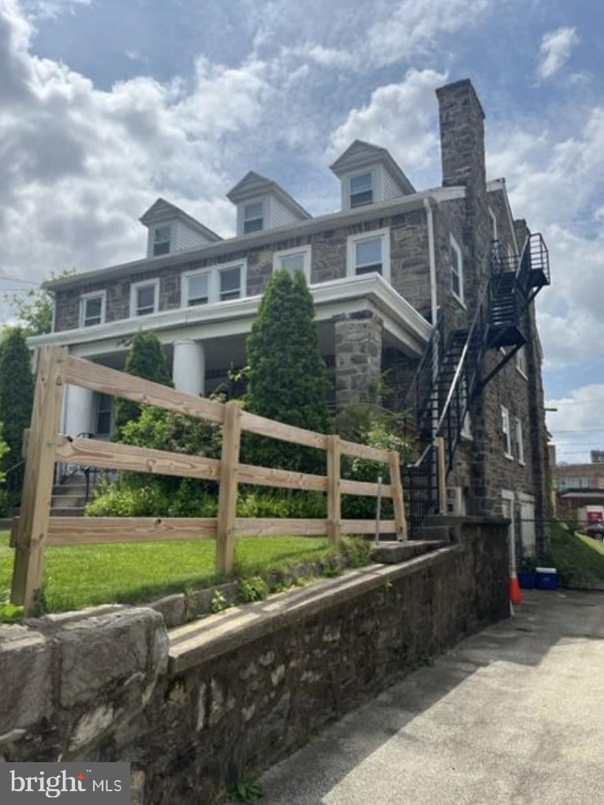 38 Copley Road Upper Darby, PA 19082 - Photo 2 of 22 a front view of a house with a yard