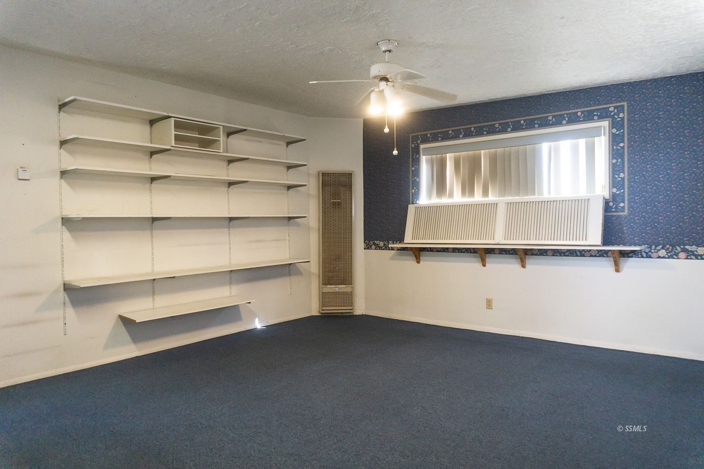 425 North Alvord Street Ridgecrest, CA 93555 - Photo 39 of 43 a view of an empty room with a window