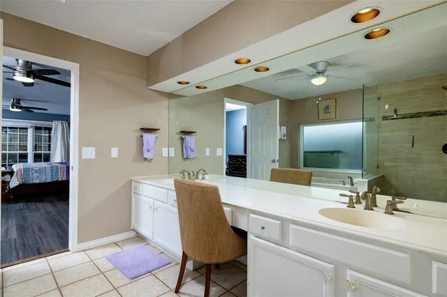 a view of bathroom with dual sinks