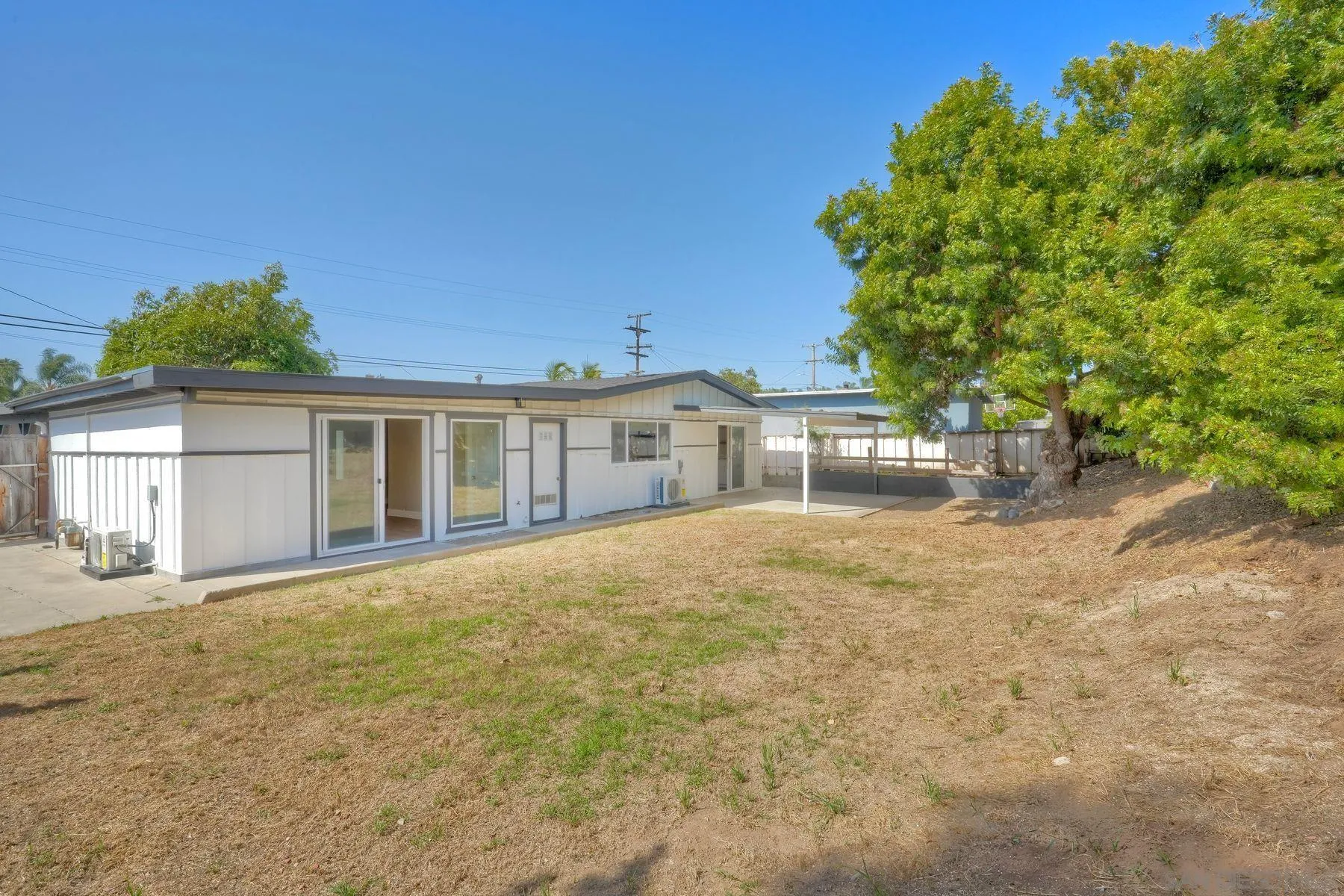 578 East Indian Rock Road Vista, CA 92084 - Photo 10 of 30 a front view of a house with a yard