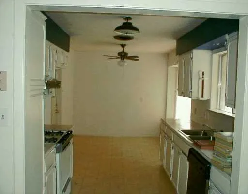 a view of a storage & utility room in a kitchen