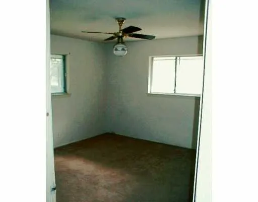 a view of empty room with a window