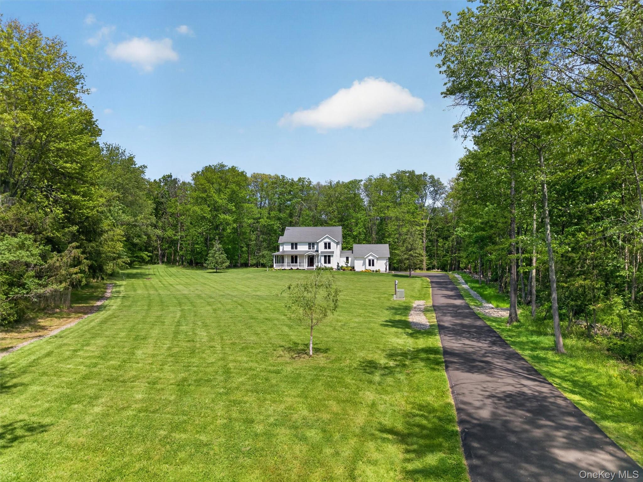 28 Bethlehem Road New Windsor, NY 12553 - Photo 3 of 50 a view of a swimming pool with a yard