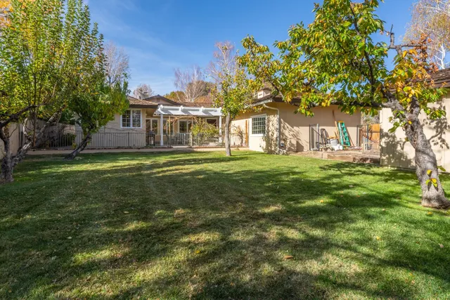 a view of a house with a big yard
