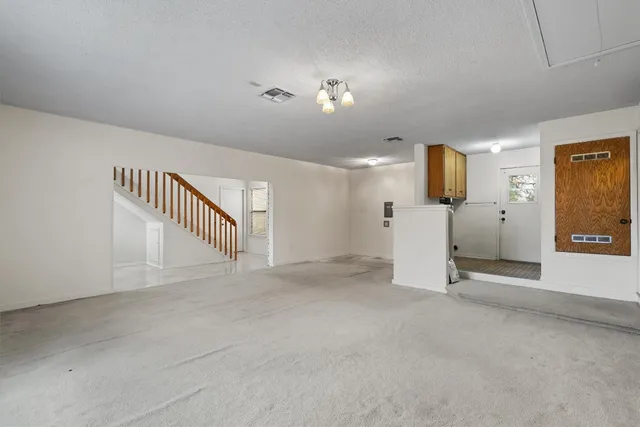 a view of a hallway with closet area