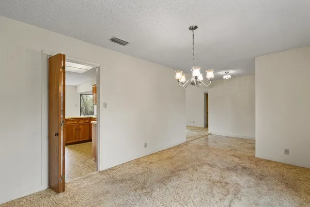 a view of a chandelier in a room