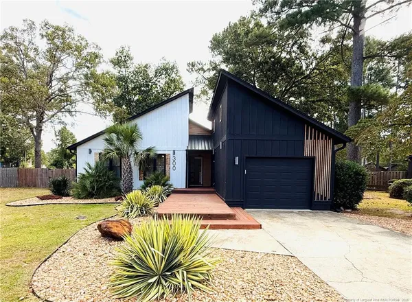a house view with a outdoor space