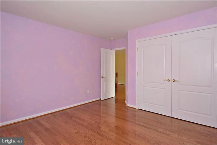 14314 Autumn Crest Road Boyds, MD 20841 - Photo 22 of 30 a view of an empty room with wooden floor