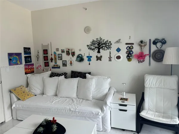 a living room with furniture and a couch