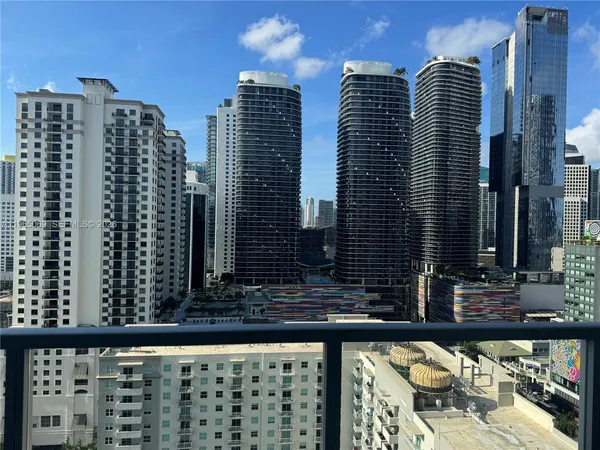 a view of a balcony with a street view