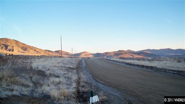 1240 Serpentine Road Reno, NV 89506 - Photo 13 of 13 a view of a mountain with a yard