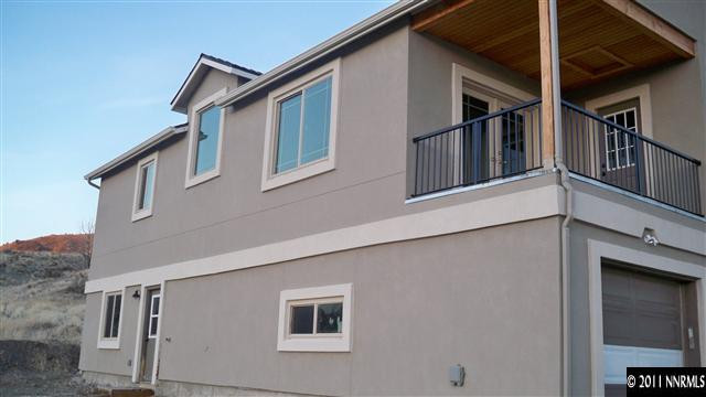 1240 Serpentine Road Reno, NV 89506 - Photo 2 of 13 a house that has window in it