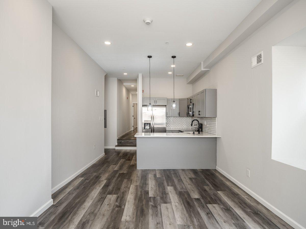 623 West Oxford Street Philadelphia, PA 19122 - Photo 14 of 39 a view of kitchen with wooden floor
