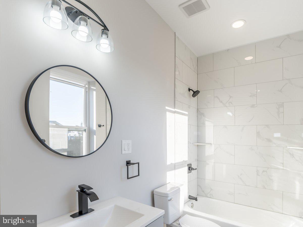 623 West Oxford Street Philadelphia, PA 19122 - Photo 18 of 39 a bathroom with a sink and a mirror