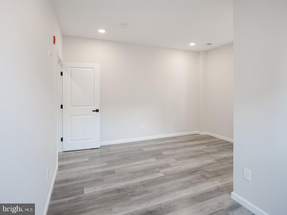 623 West Oxford Street Philadelphia, PA 19122 - Photo 31 of 39 a view of room with wooden floor