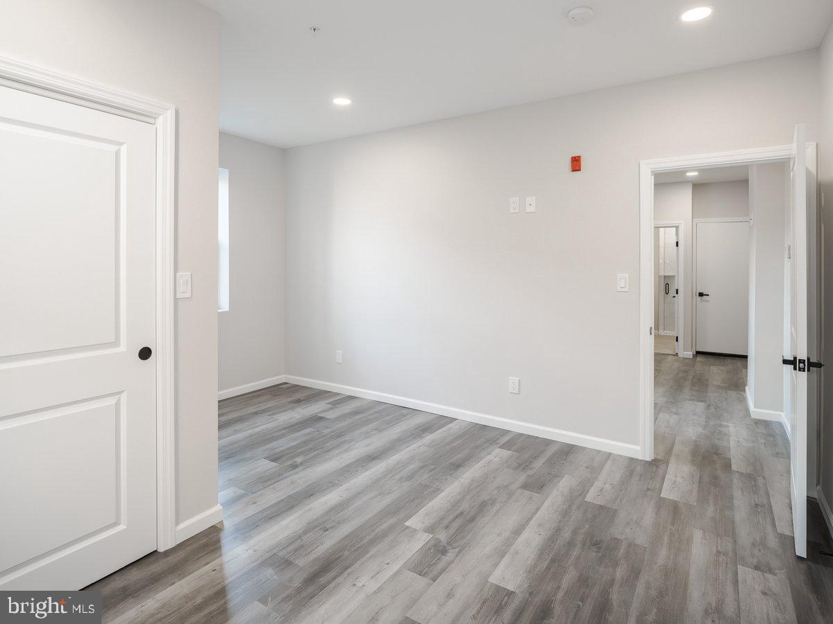 623 West Oxford Street Philadelphia, PA 19122 - Photo 32 of 39 a view of a hallway with wooden floor