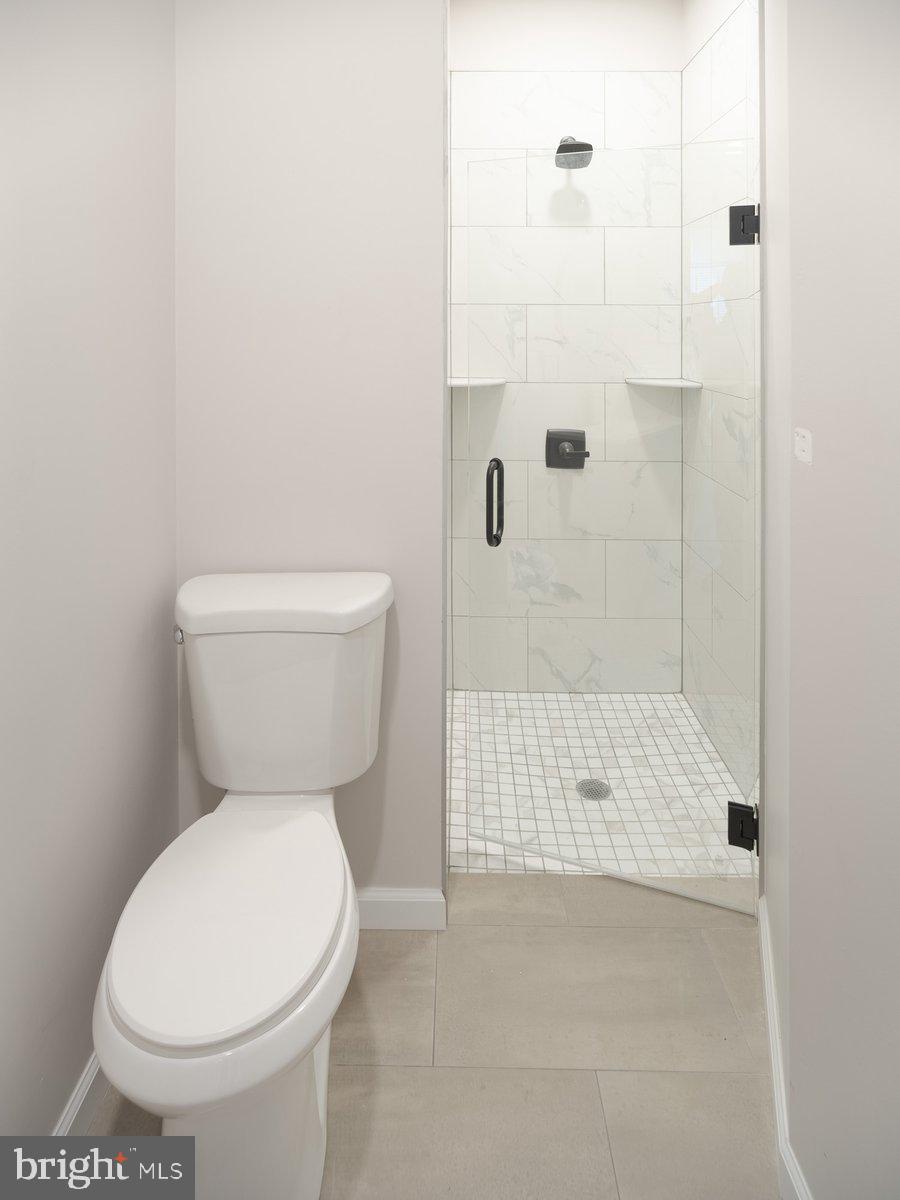 623 West Oxford Street Philadelphia, PA 19122 - Photo 34 of 39 a bathroom with a toilet and a shower