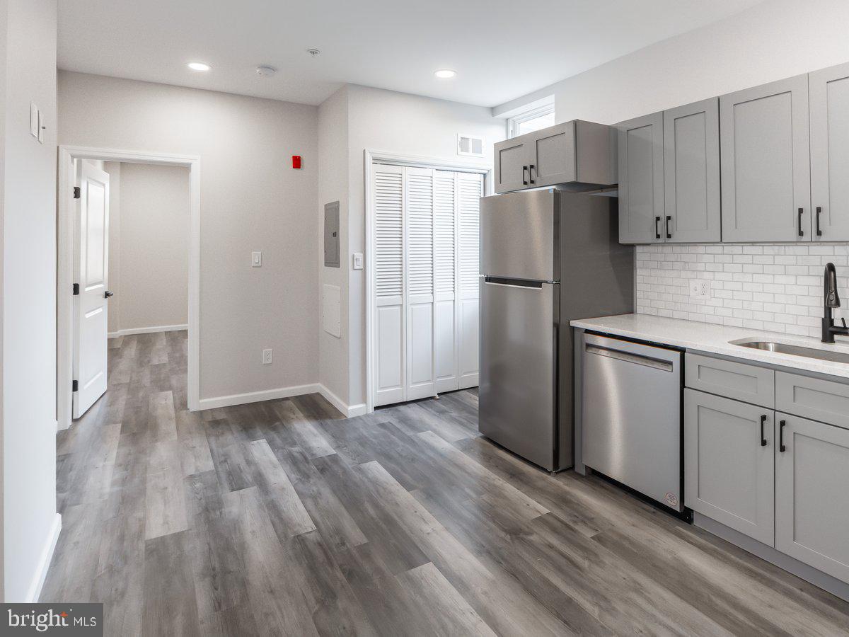 623 West Oxford Street Philadelphia, PA 19122 - Photo 38 of 39 a view of kitchen space with wooden floor