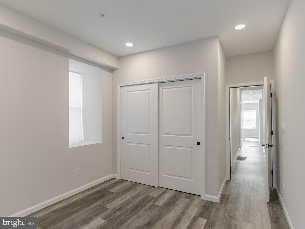 623 West Oxford Street Philadelphia, PA 19122 - Photo 8 of 39 wooden floor in an empty room with a window
