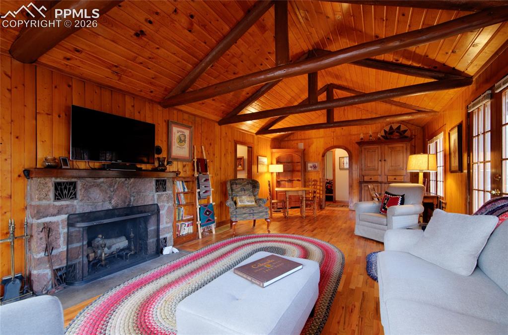 9455 Mohawk Trail Cascade, CO 80809 - Photo 4 of 33 Wonderful cozy warm living room with lots of light