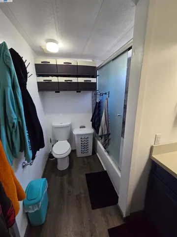 a bathroom with a sink and toilet