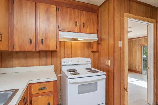 a view of a storage and utility room with washer and dryer