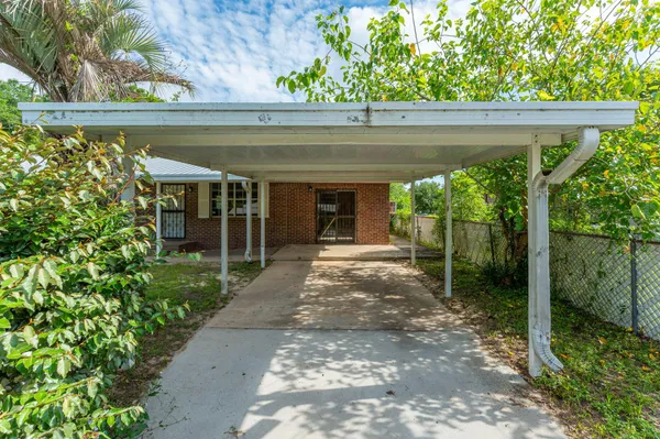 a house view with a garden space