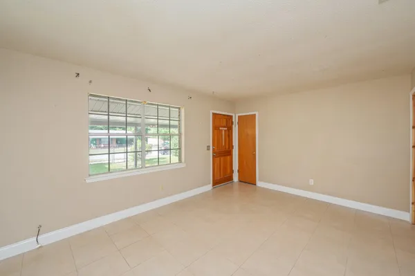 an empty room with windows