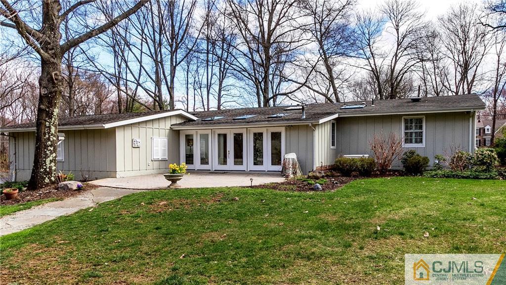 338 Springhill Road Skillman, NJ 08558 - Photo 22 of 23 a view of a house with backyard and sitting area