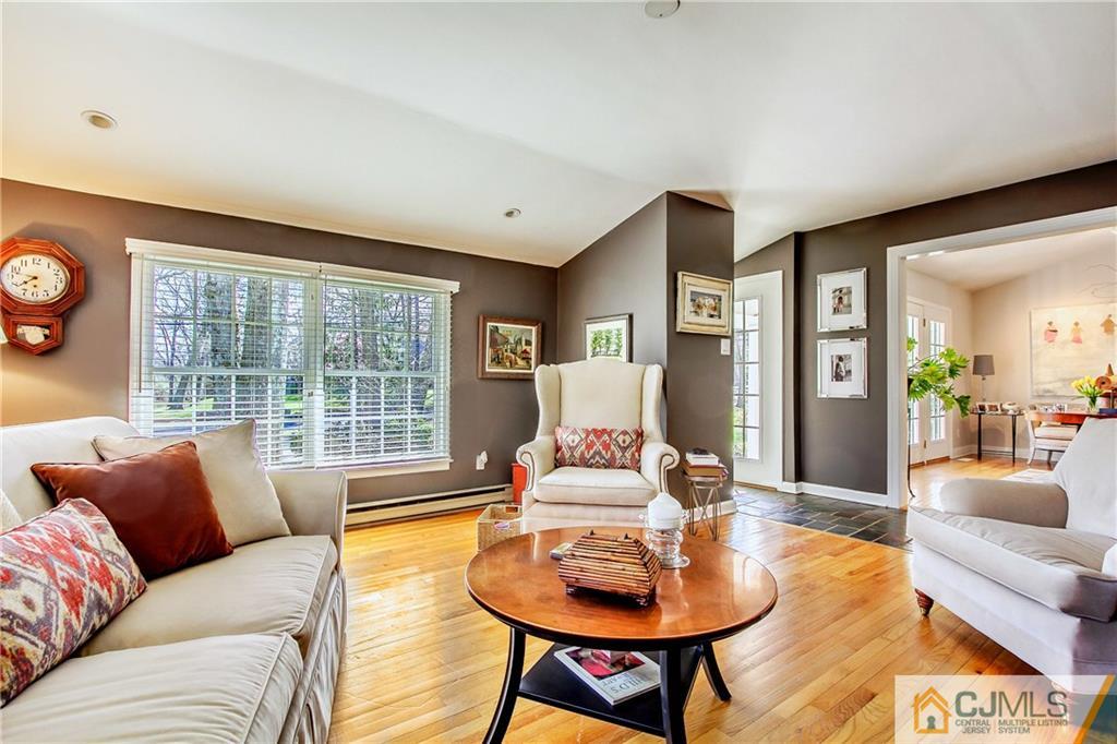 338 Springhill Road Skillman, NJ 08558 - Photo 5 of 23 a living room with furniture and a large window