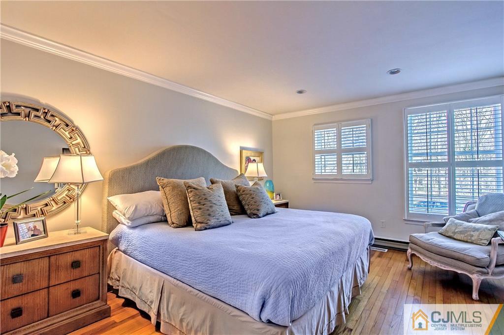 338 Springhill Road Skillman, NJ 08558 - Photo 7 of 23 a bedroom with a bed and a window