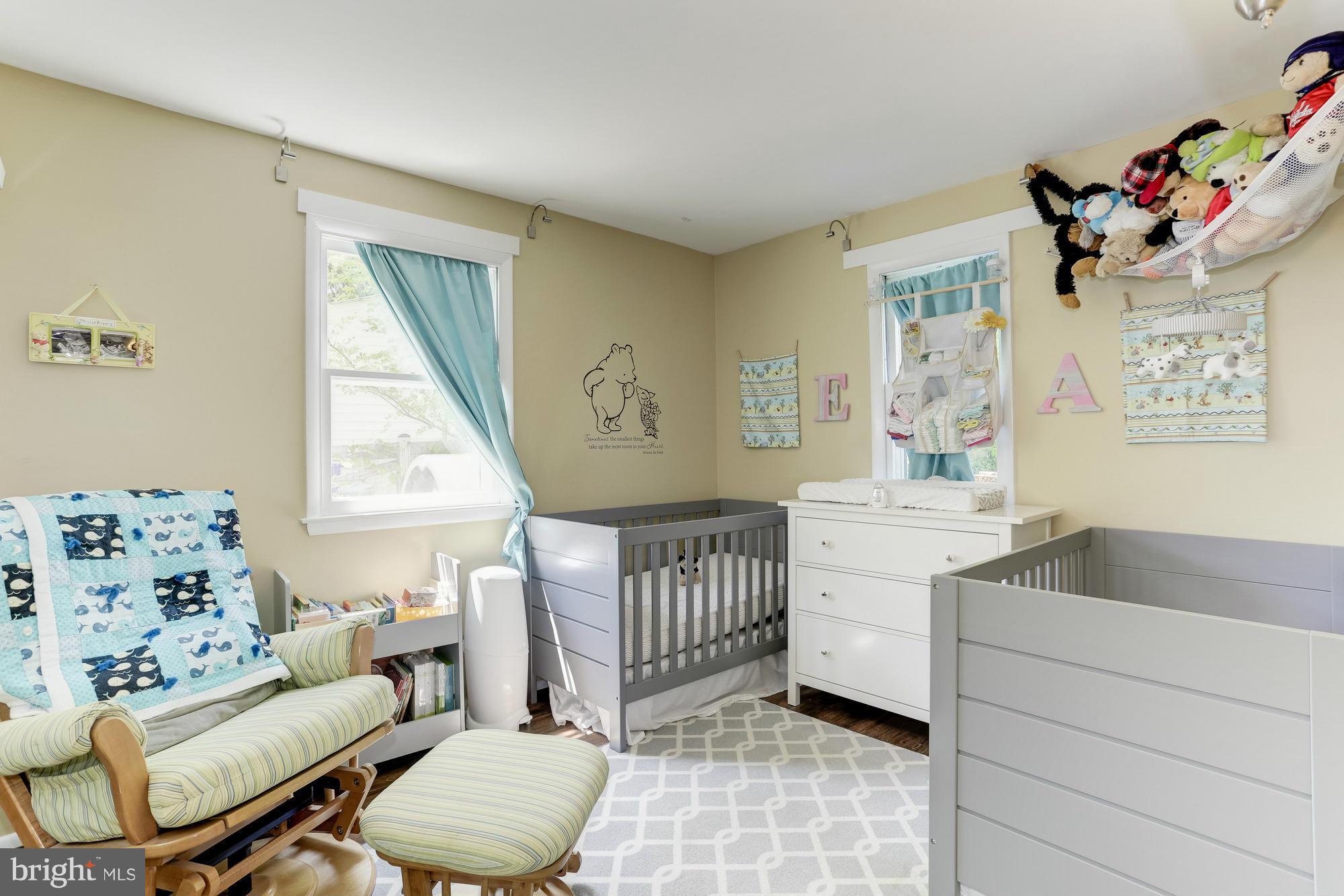 23 Ericsson Road Cabin John, MD 20818 - Photo 19 of 30 a living room with furniture and a window
