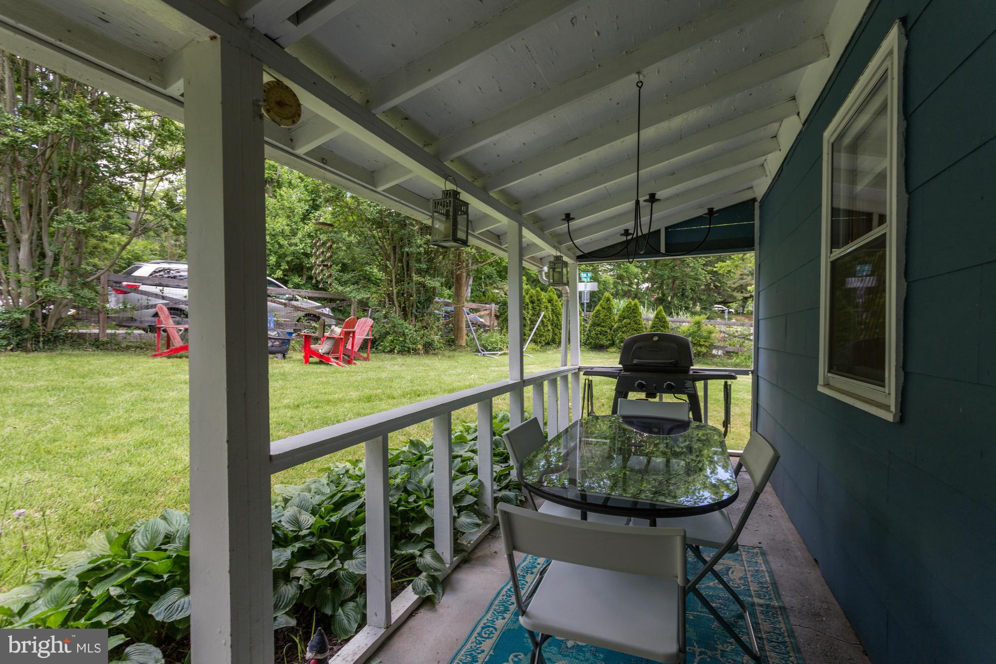 23 Ericsson Road Cabin John, MD 20818 - Photo 24 of 30 a view of two chairs in balcony