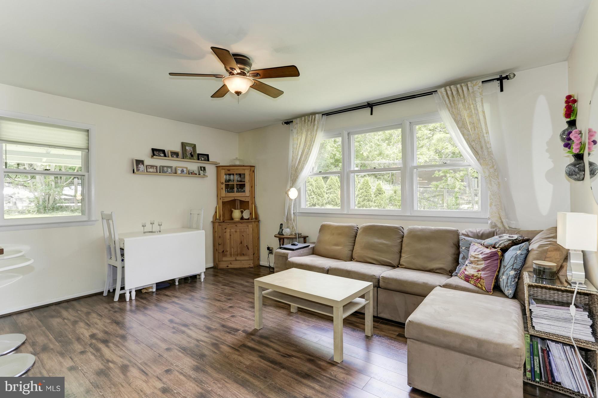 23 Ericsson Road Cabin John, MD 20818 - Photo 5 of 30 a living room with furniture and a window