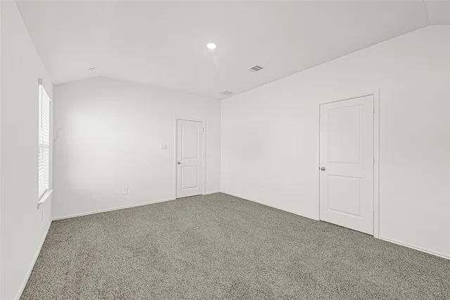 a bathroom with a double vanity sink and mirror